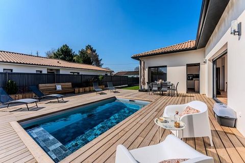 In the heart of Biganos, where the charm of southwestern France meets modern comfort, this stunning villa offers an idyllic retreat for families or friends. Imagine waking up to the gentle sounds of nature, stepping onto your expansive wooden terrace...